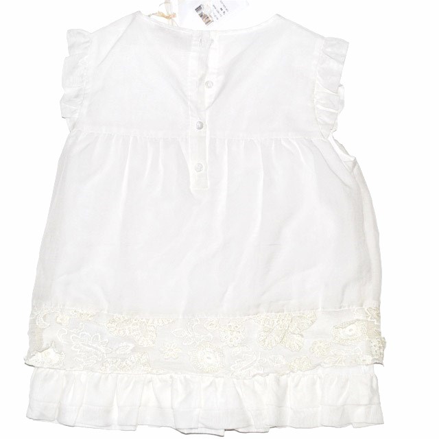 Фото 3: Белоснежное платье для маленьких модниц 