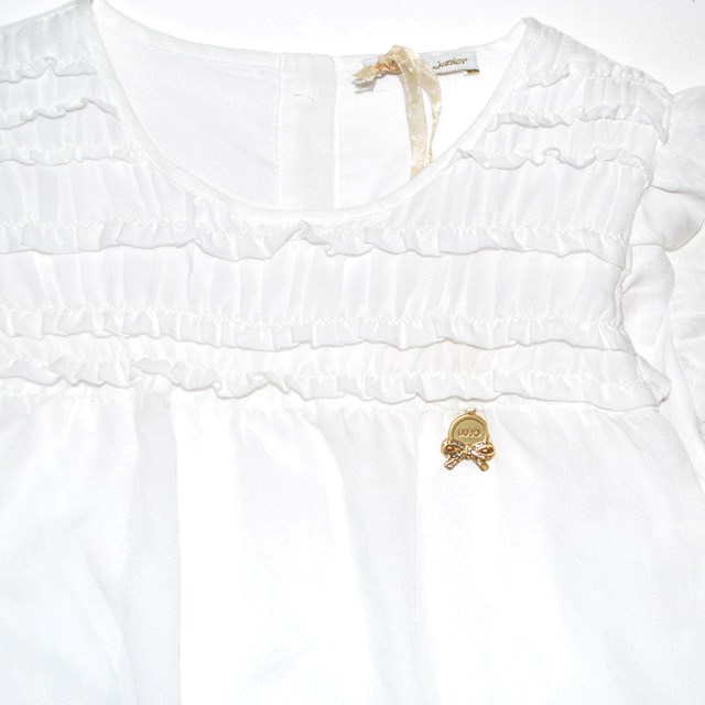Фото 4: Белоснежное платье для маленьких модниц 