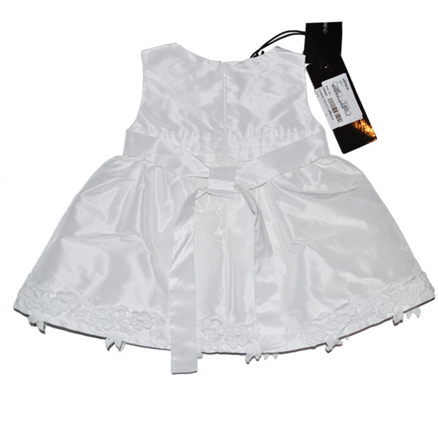 Белоснежное платье для маленьких модниц. Фото: 2